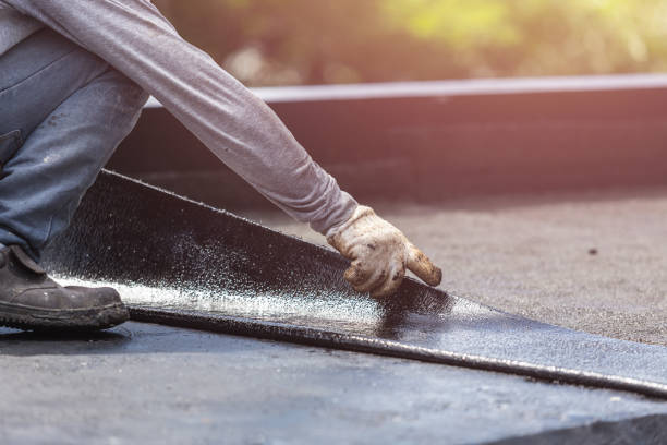 Professional Basement Waterproofing technician working in Lawrence, NY